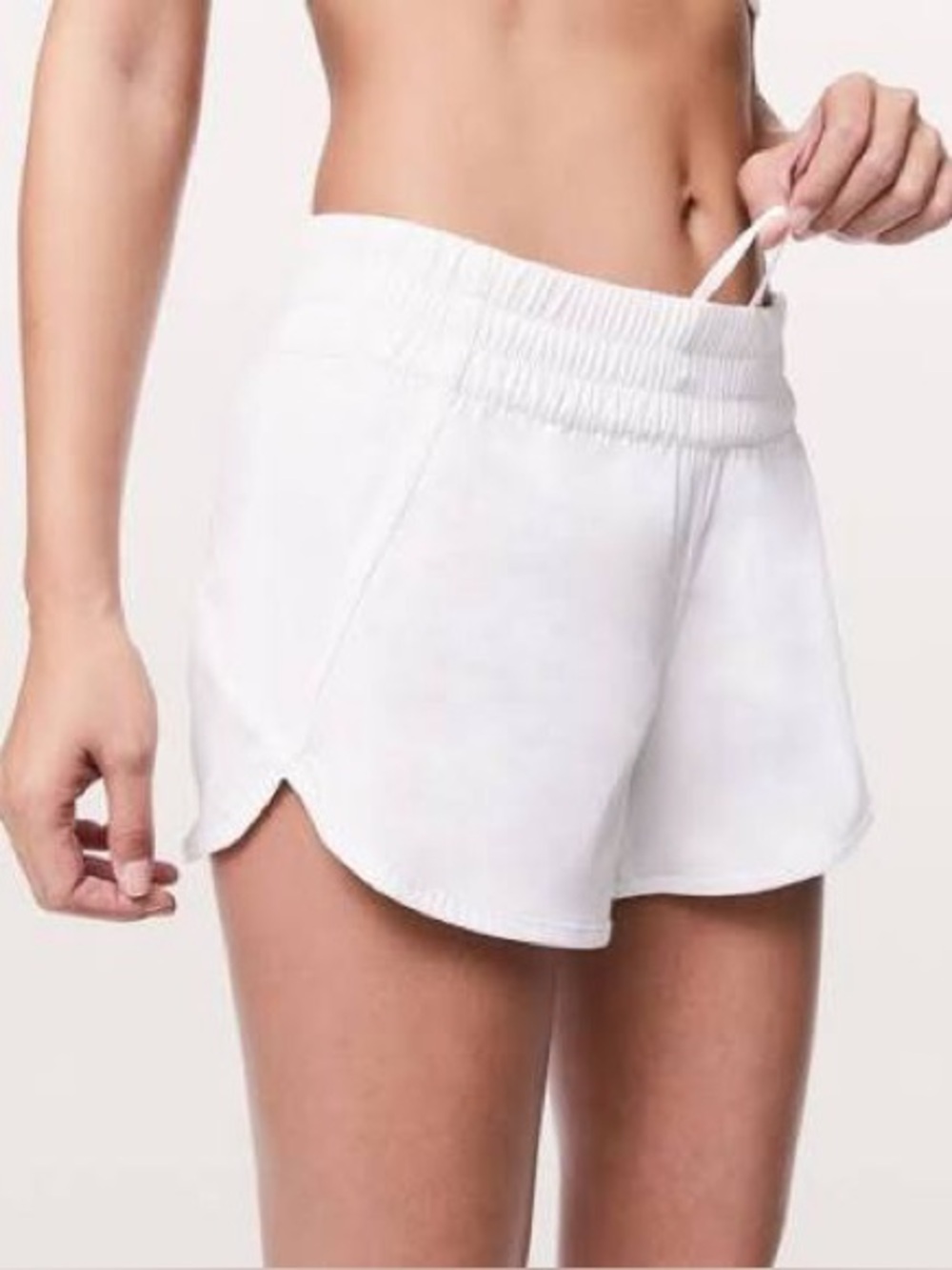 White lululemon Women's Tracker mid-rise Shorts 4” 2-way stretch